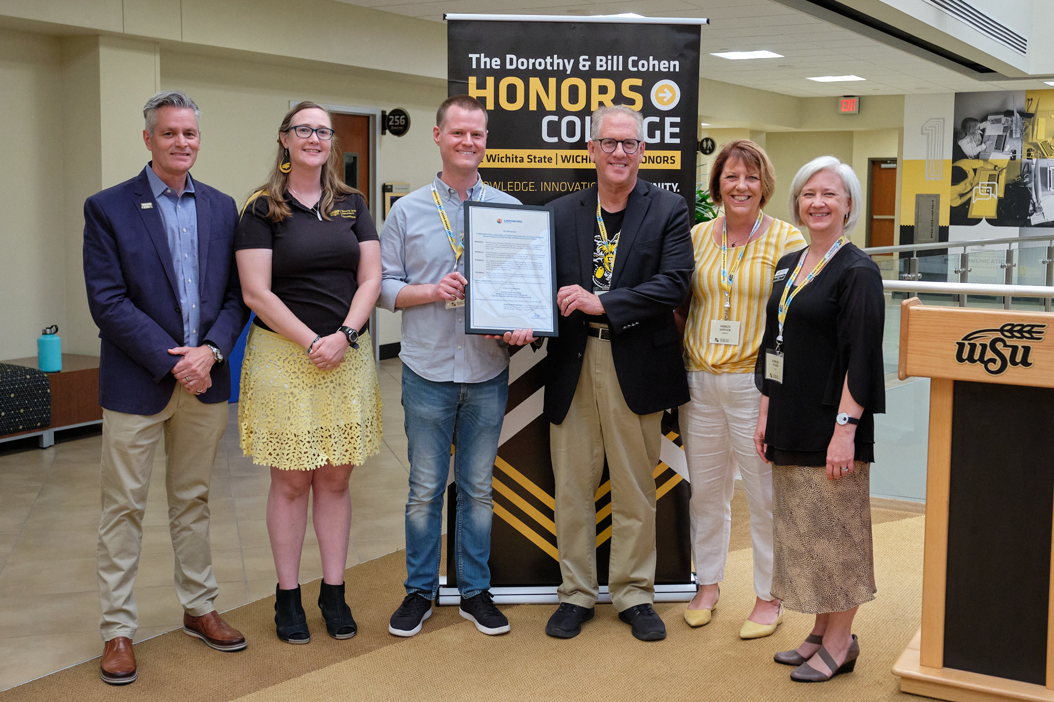 The Mayor of Lindsborg, presented a proclamation in celebration of Wichita State University, the Emory Lindquist Honors Program, and the Dorothy and Bill Cohen Honors College.