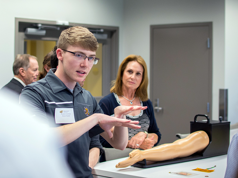Honor student giving a presentation.