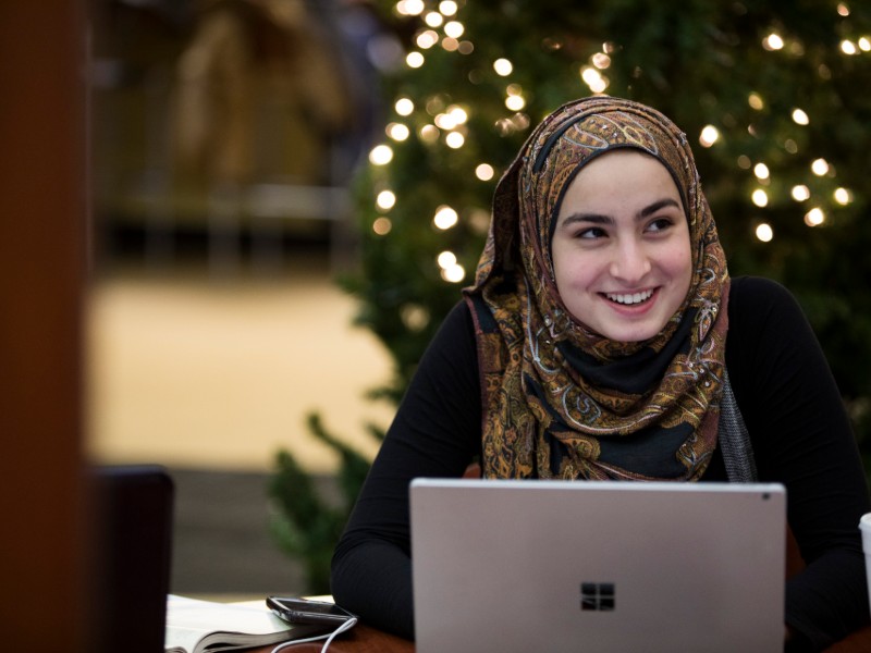 student working on a laptop