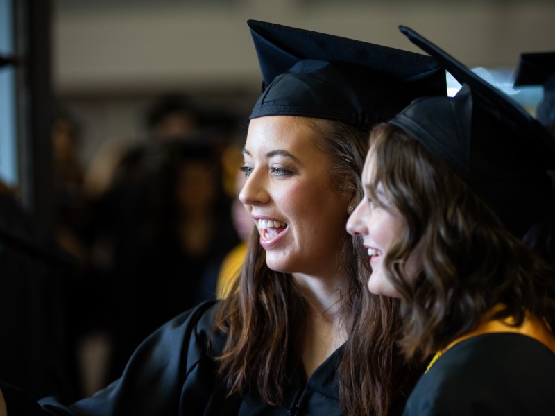 2 students graduating