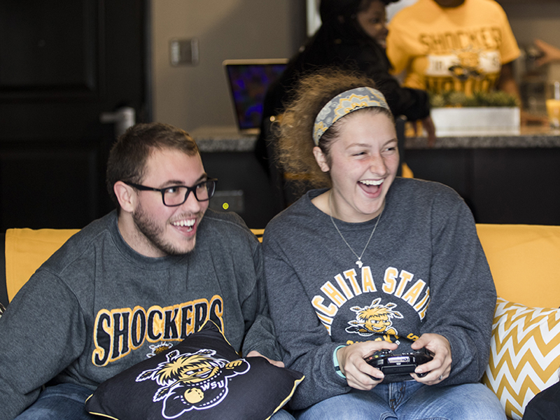 Students hanging out playing video games