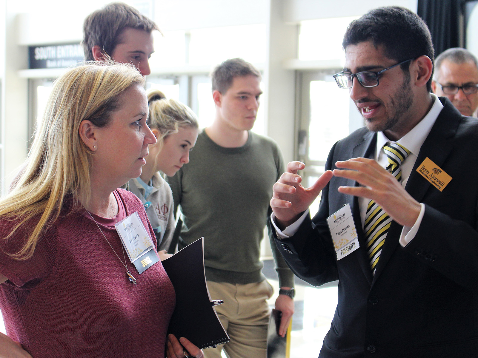 two people talking about a startup