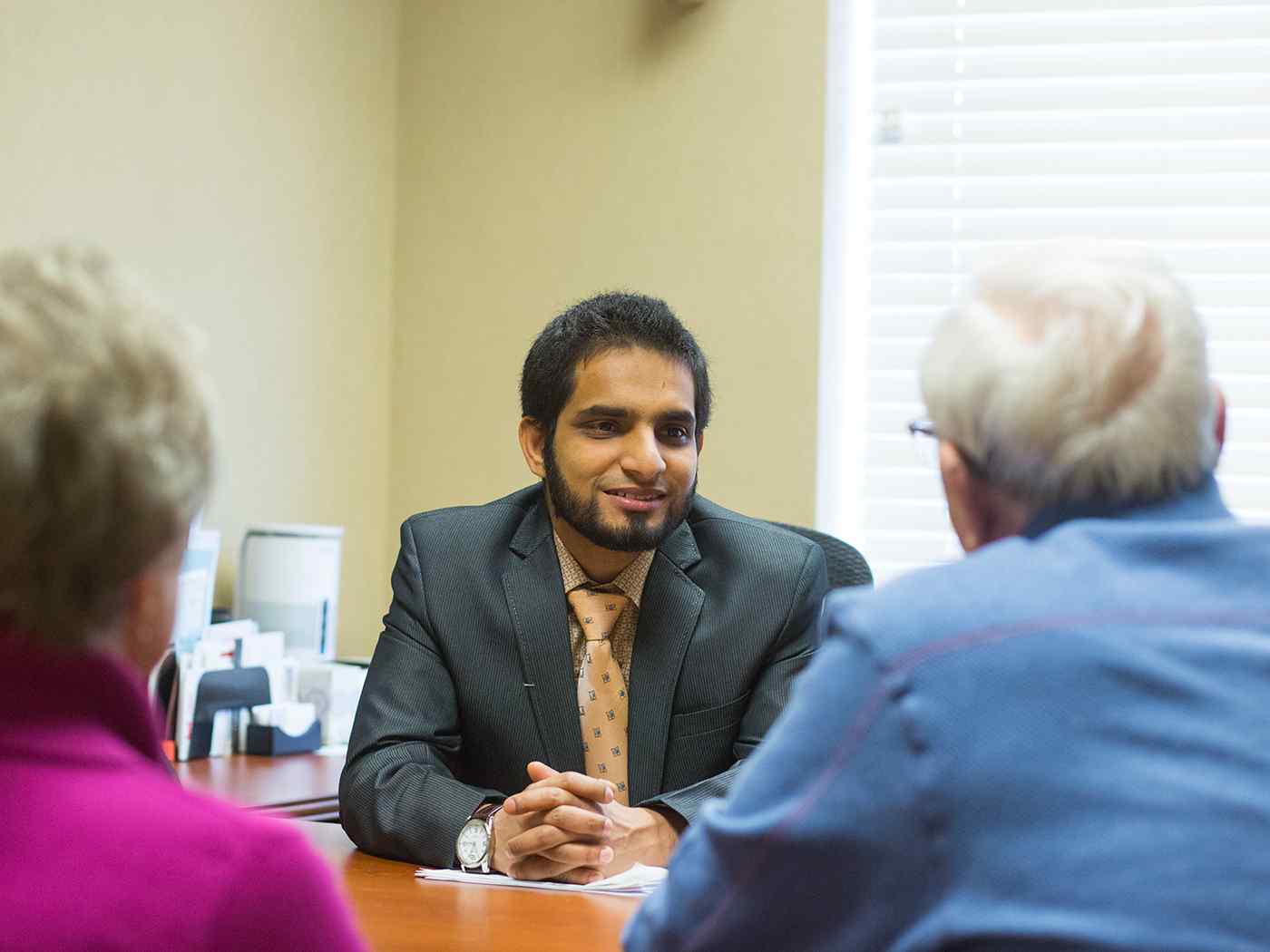 A student meets with his clients