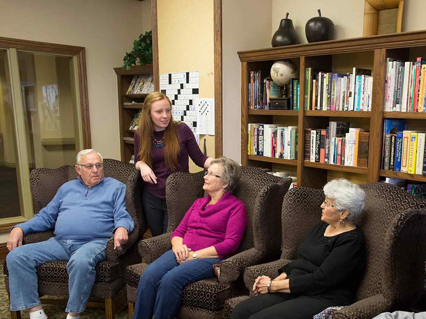 Student with her clients.