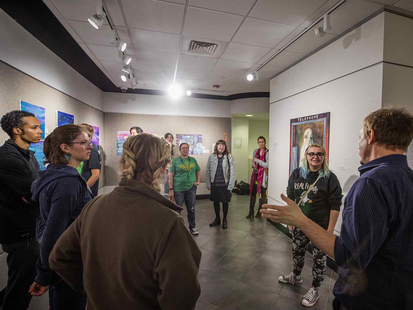 Students looking at an art gallery.