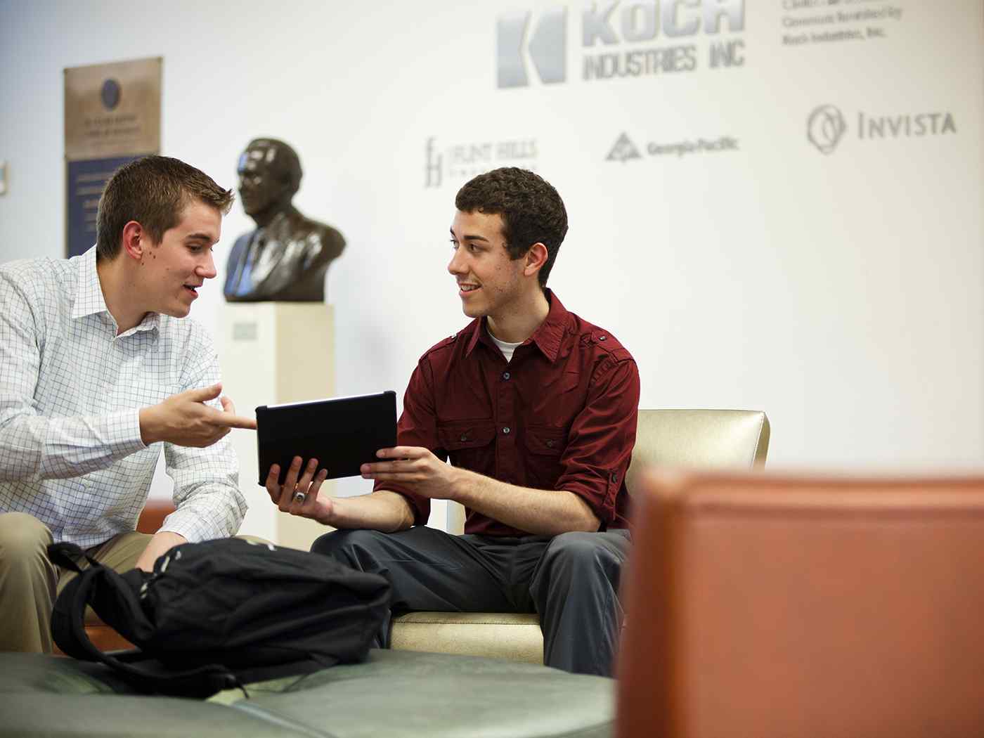 Clinton Hall lobby student talking