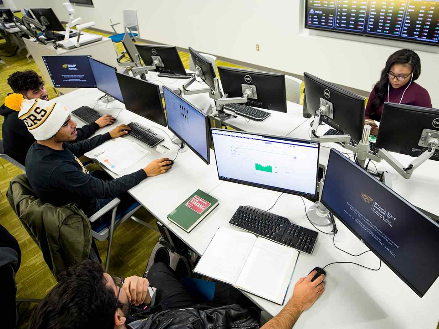 Business students attending class at Koch Trading Center. 