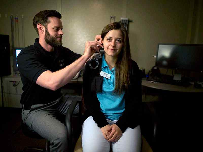 Students work with patients in the Speech-Language-Hearing Clinic.