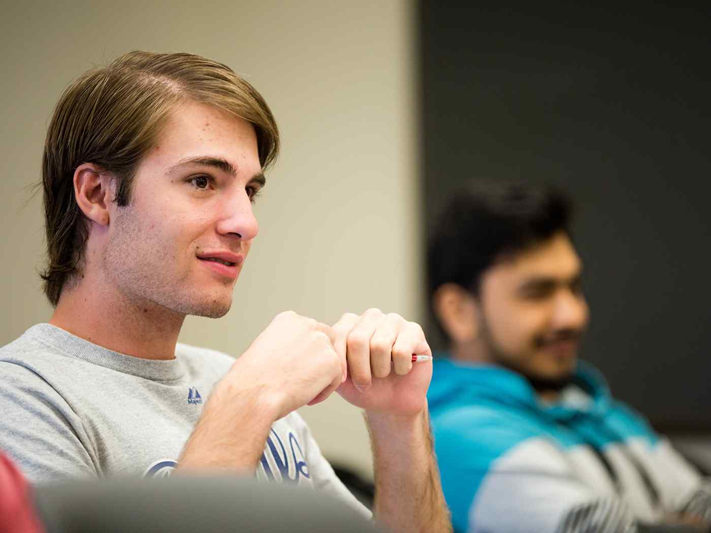 Two students seated in class