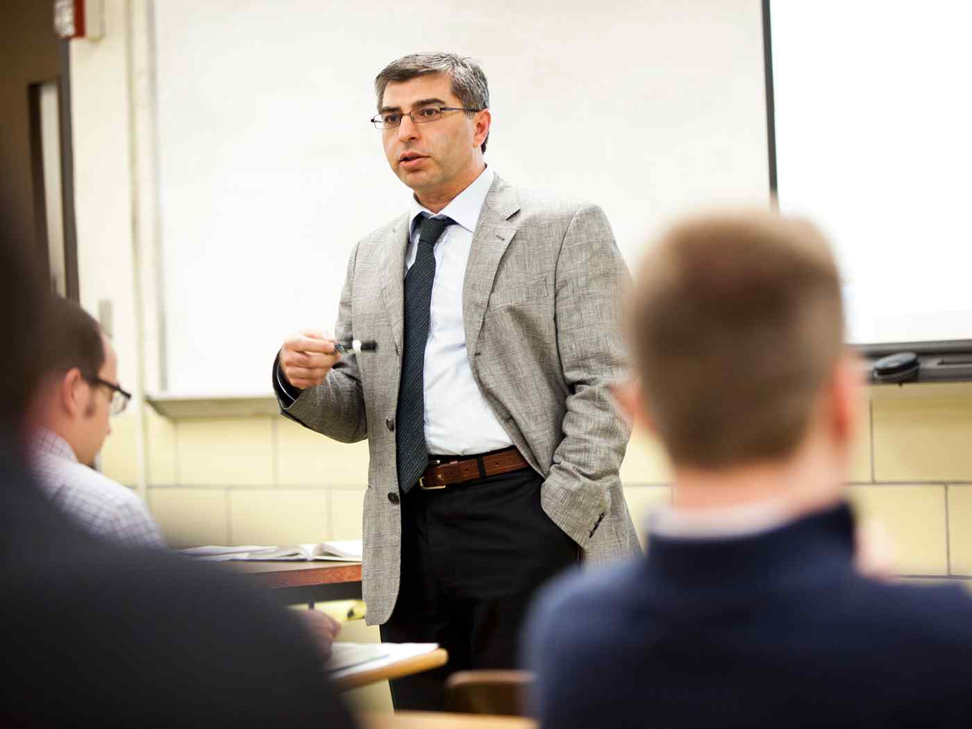 Dr. Barut teaching a Management course.