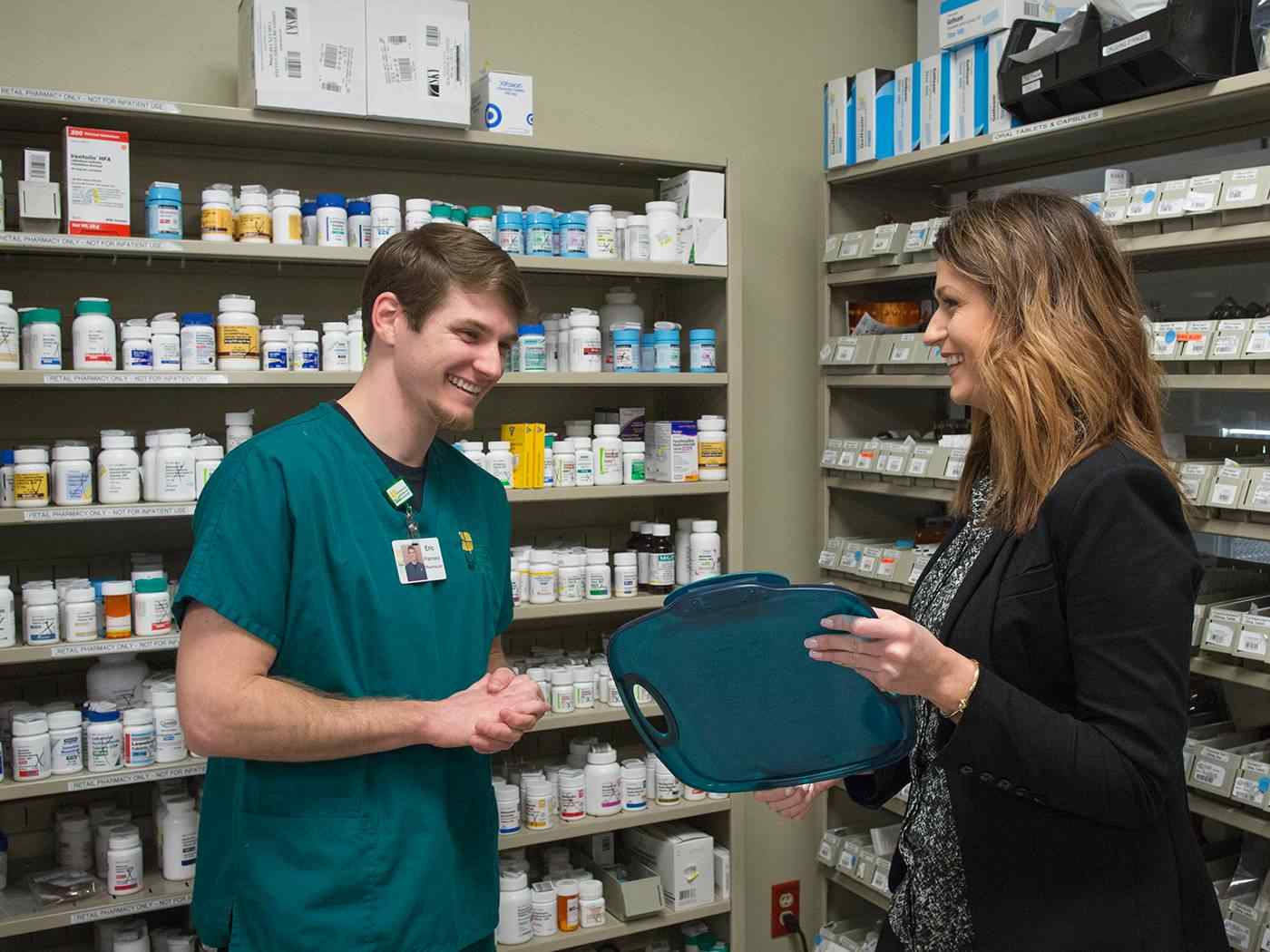 Two students having a discussion about prescriptions.