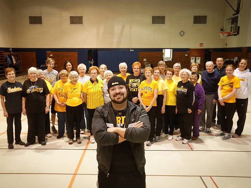 A student poses with an aging studies exercise class