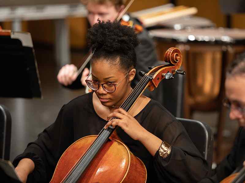 A student plays the cello