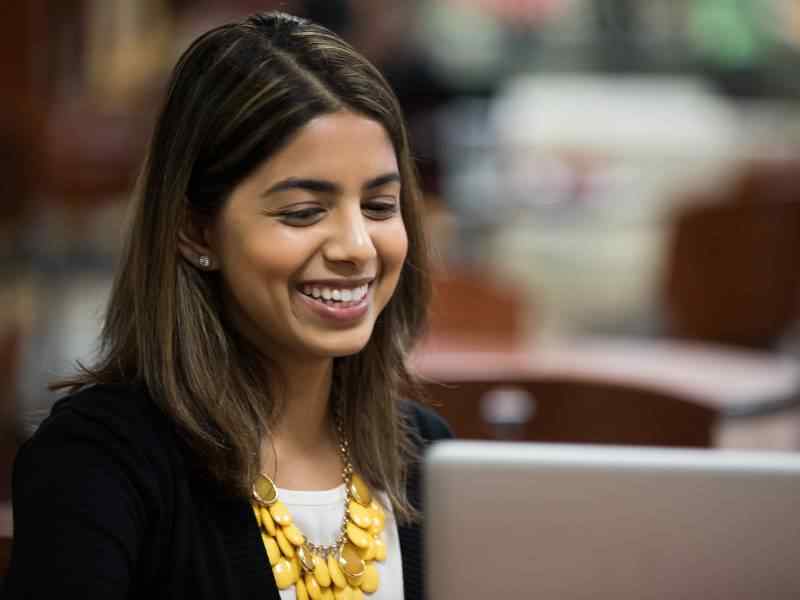 Female student with a laptop