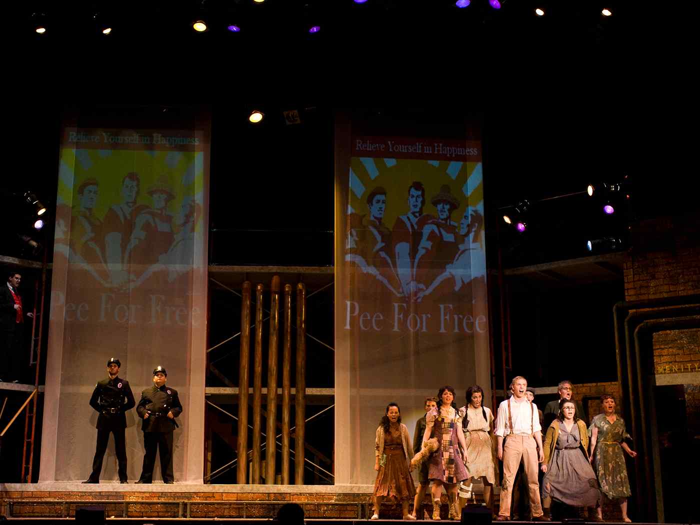 Students performing on stage.