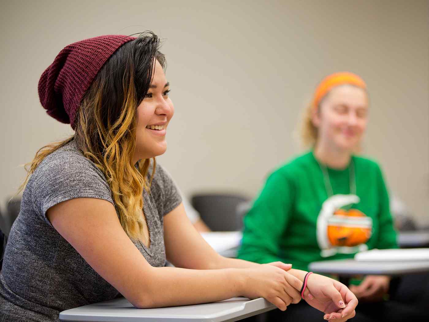 Student listening to a lecture in the classroom.