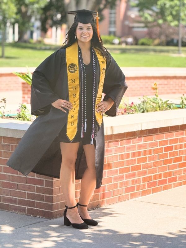 Daniela with her cap and gown