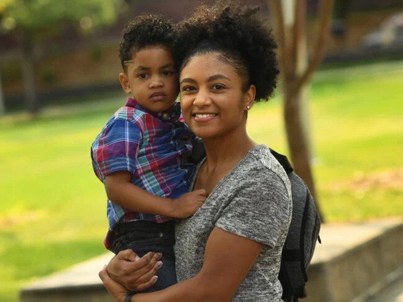 Mom and child smiling