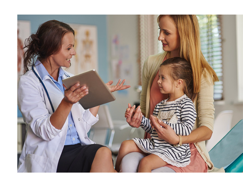 Smiling nurse evaluating patient