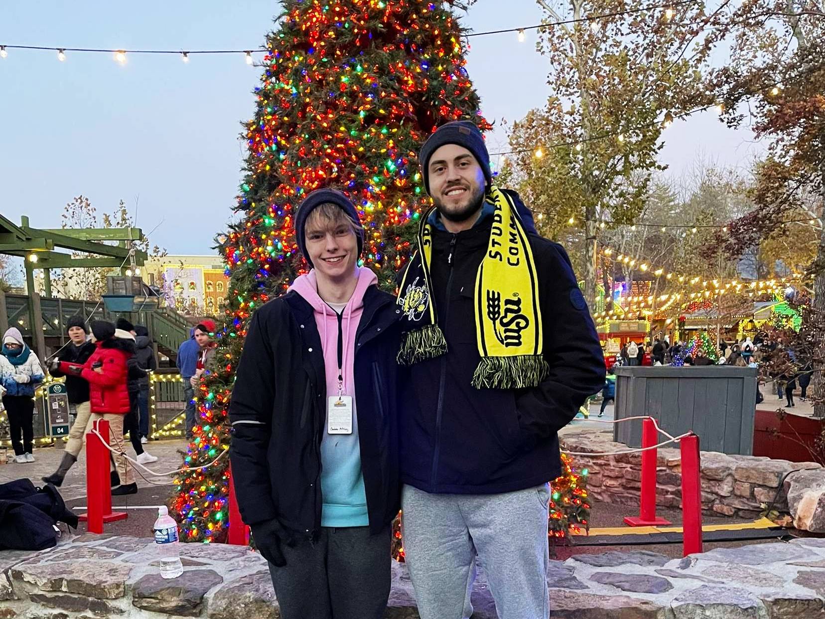 Caleb and Marcelo with Christmas tree