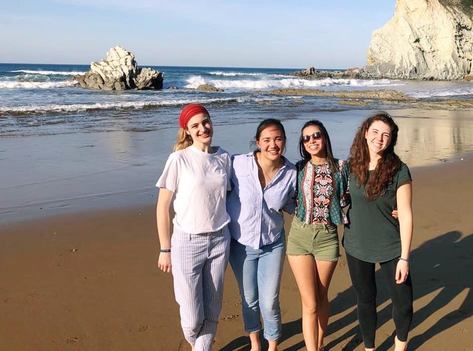 Holly with friends at beach