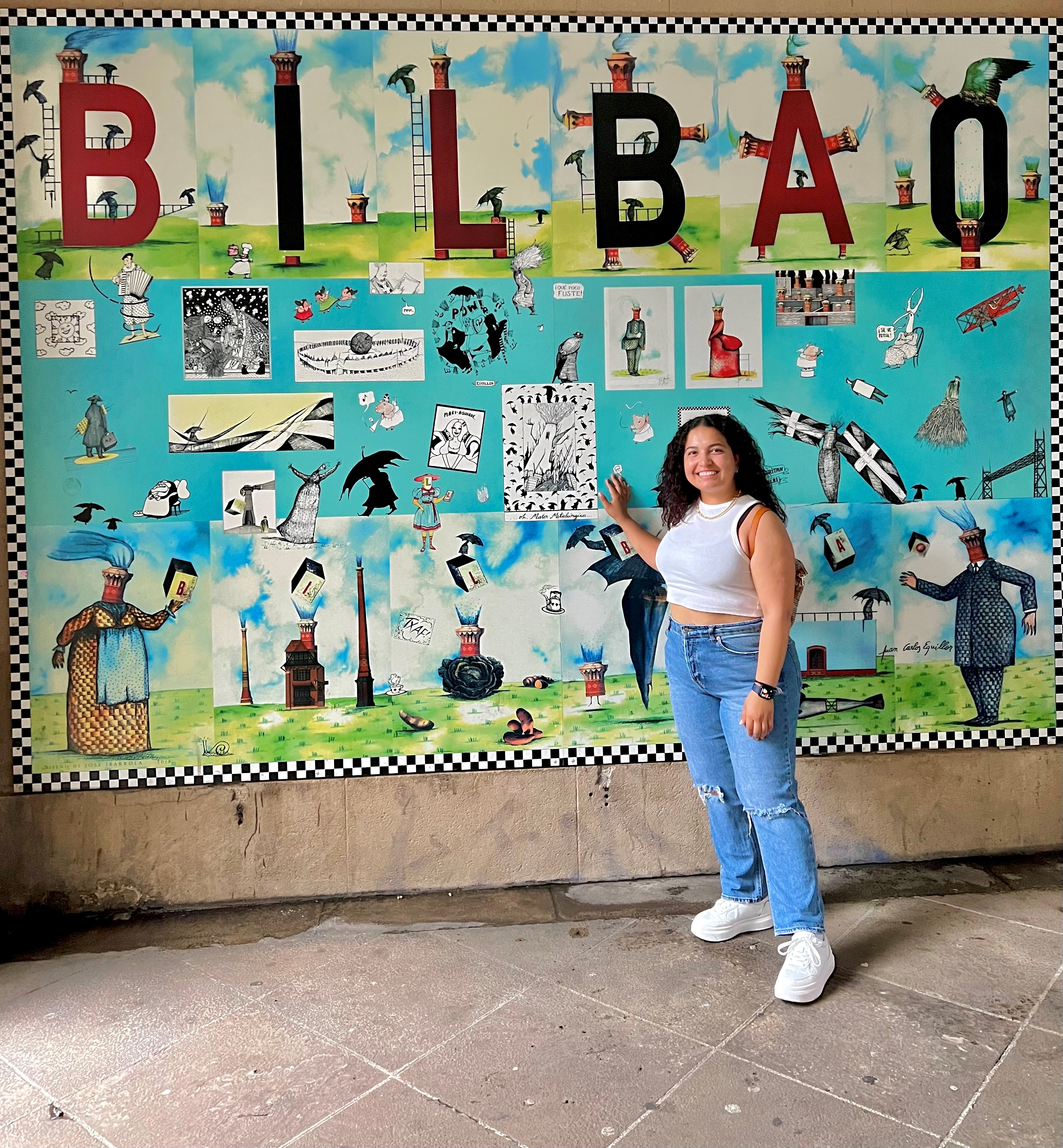 Tais with Bilbao art sign