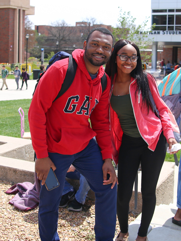 students pose on chapel steps