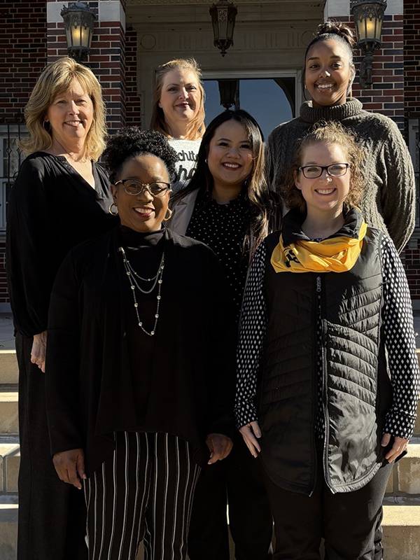 advising team standing outside