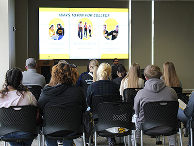 Students and parents at a seminar