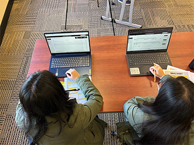 Students at a workshop on laptops