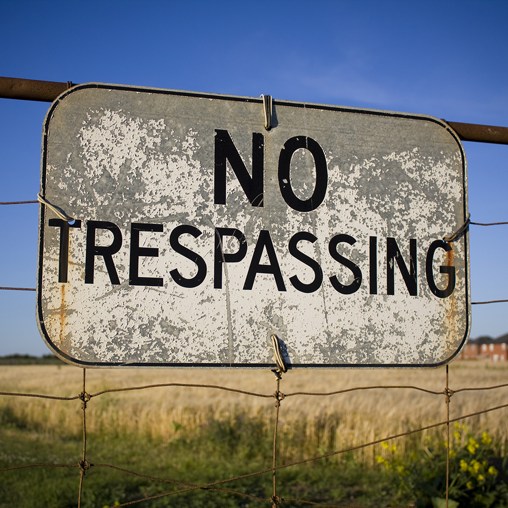 Picture of a sign that says "No trespassing"