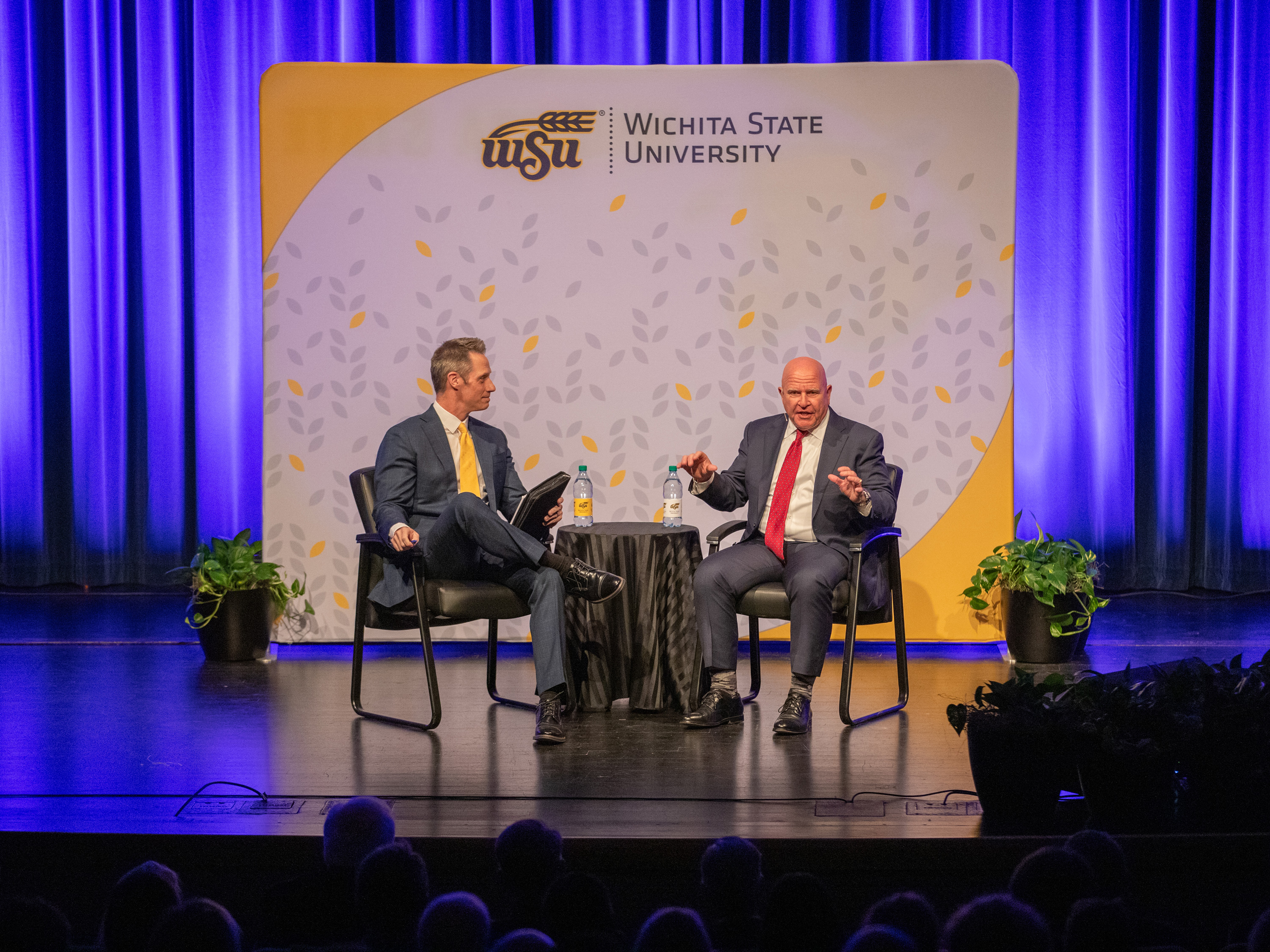 Jeff Herndon, left, listens to Retired Gen. H.R. McMaster at the 2026 Barton Speaker Series event.