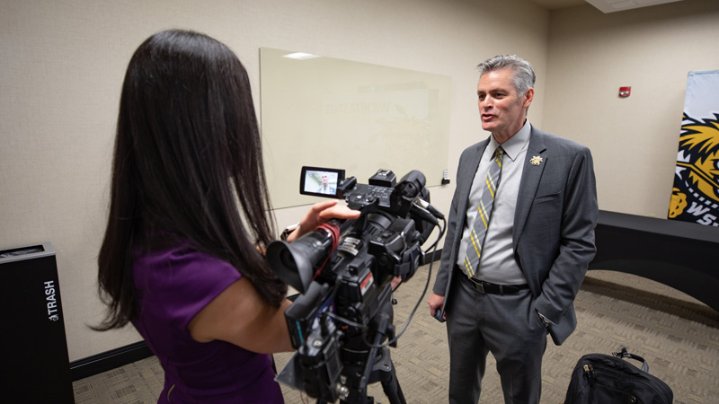 Rick with media