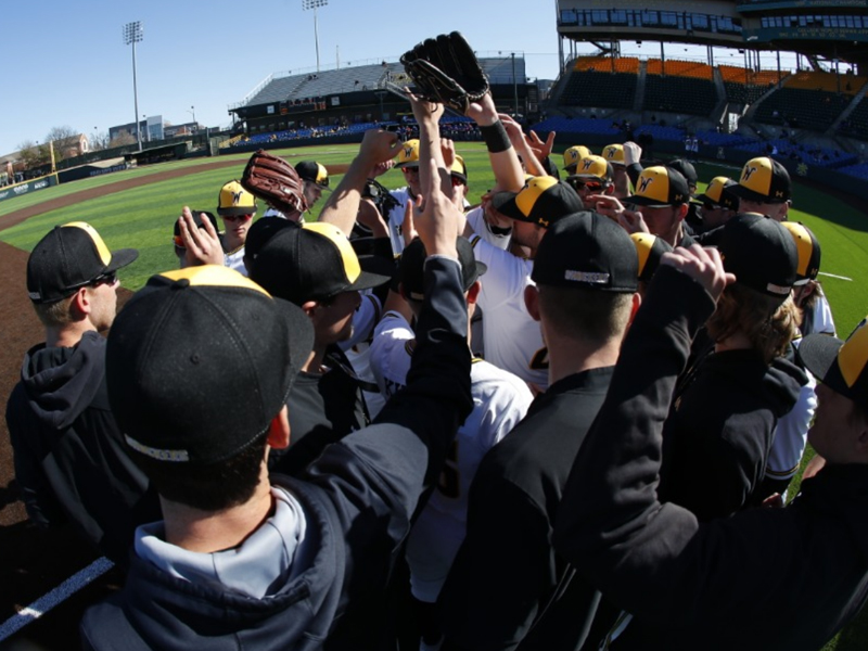 WSU Baseball Team huddles before a game