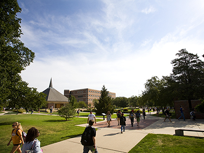 Students walk in front of Grace Memorial Chapel on their way to fall classes