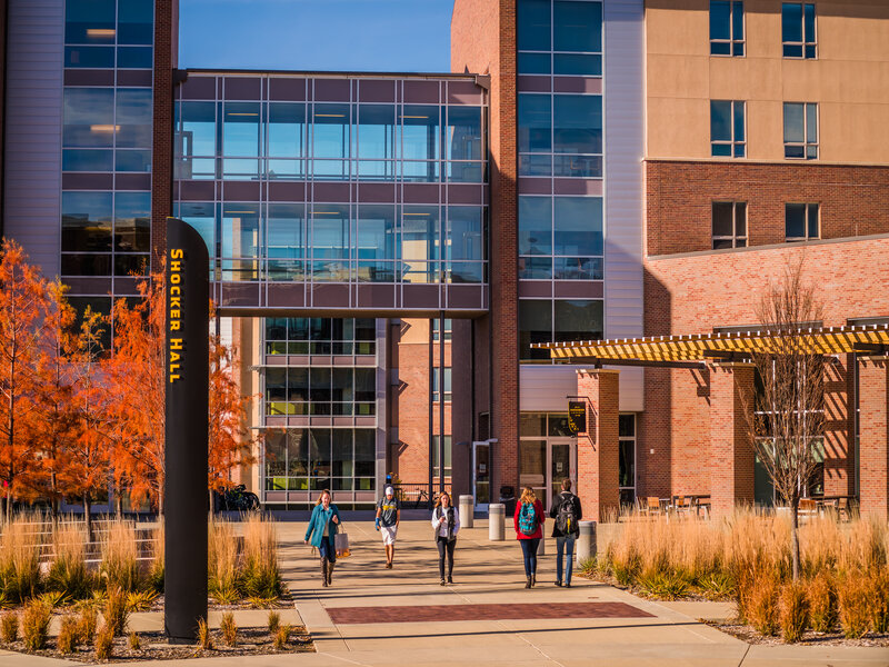Students walking in front of Shocker Hall