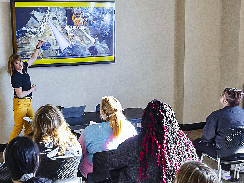 A Wichita State instructor teaches a mock class during W-S-YOU 2023.