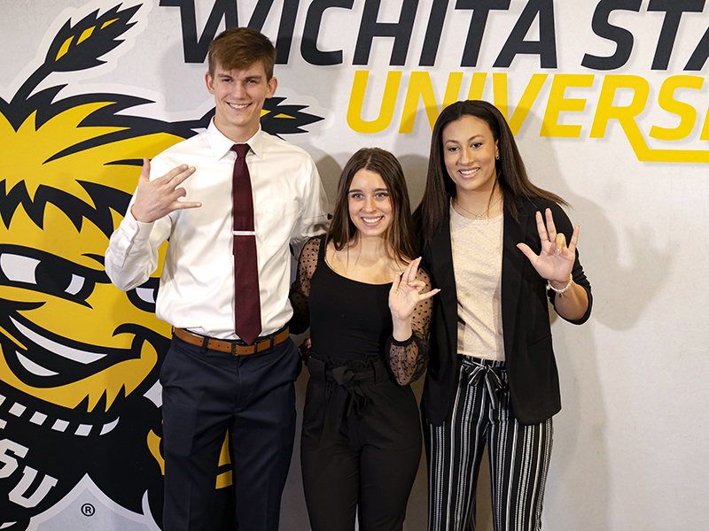 Audrey Menzies, center, poses for a photo with fellow 2022 Gore Scholars Caden Carlson and Brynna Mays.