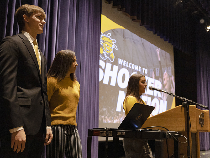 Audrey speaks at the 2023 Distinguished Scholarship Invitational with fellow Gore Scholars Caden Carlson and Brynna Mays.