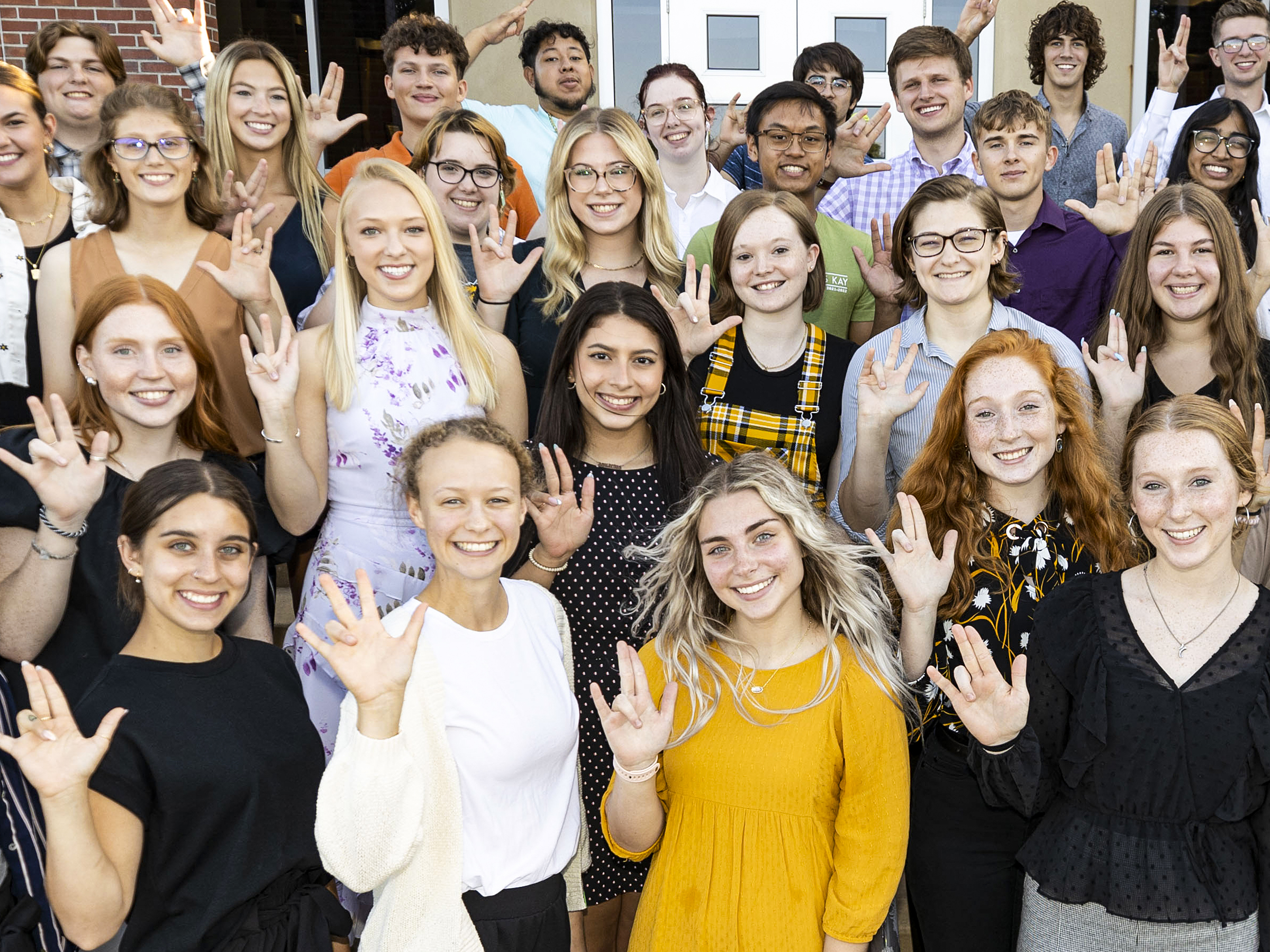2022-23 new members of Student Ambassador Society pose for a photo.