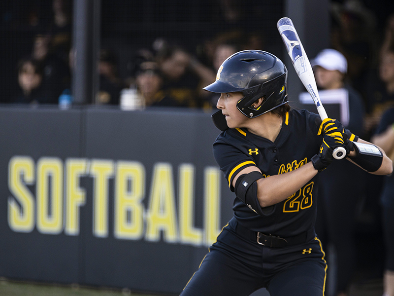 Lauren Lucas waits for the pitch during a 2022 game at Wilkins Stadium.