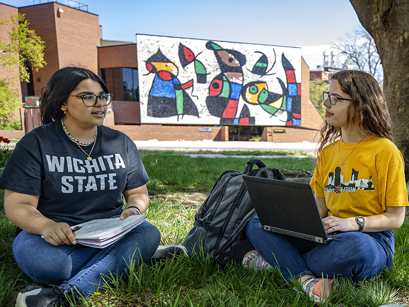 Students studying outside of the Ulrich Art Museum.