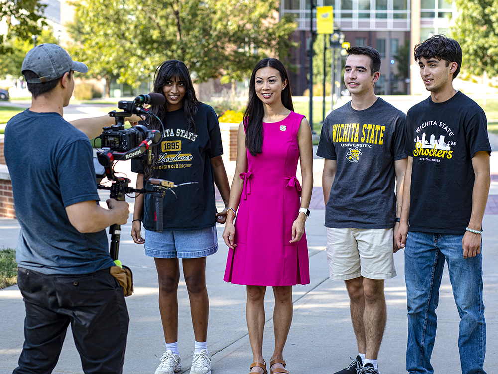 Wichita State students and Wichita Mayor Lily Wu during The College Tour shoot.