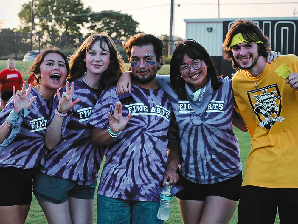 Enrich Grace Patdu (second from right) with her friends in the College of Fine Arts during Wichita State's Clash of Colleges.