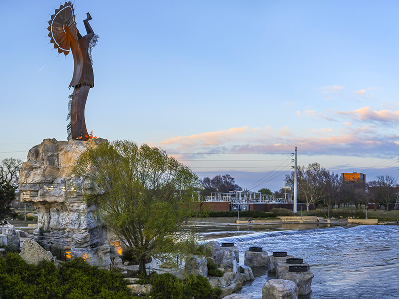 The Keeper of the Plains is a 44-foot tall steel art piece at the confluence of the Arkansas and Little Arkansas Rivers in downtown Wichita.