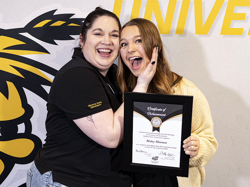 Rani Somers, Recruitment Coordinator for the Barton School of Business, shares a smile with Maley Hansen, 2023 Gore Scholar.