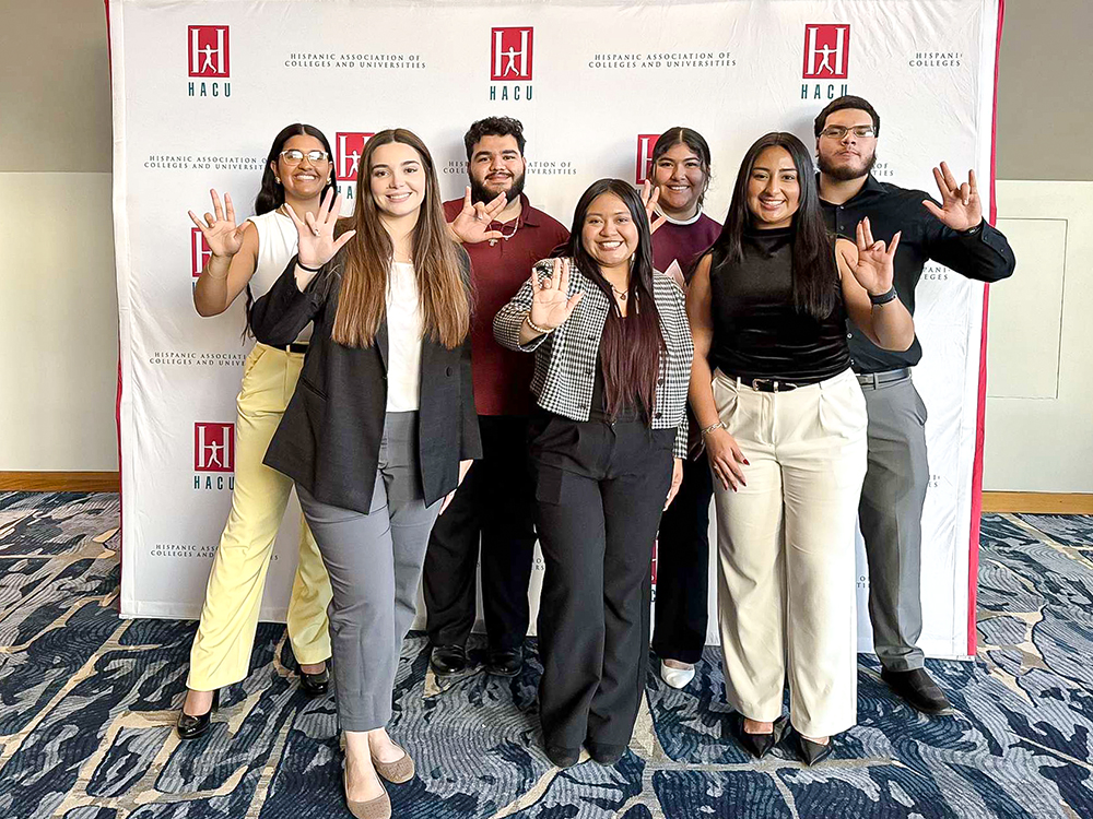 Lesly Hernandez, right, at the Hispanic Association of College & Universities Conference.