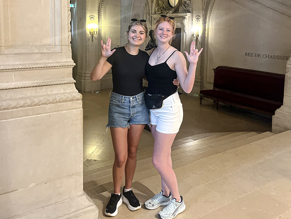Sophie Walter and Ellie Stringer inside of the Louvre in Paris, France.