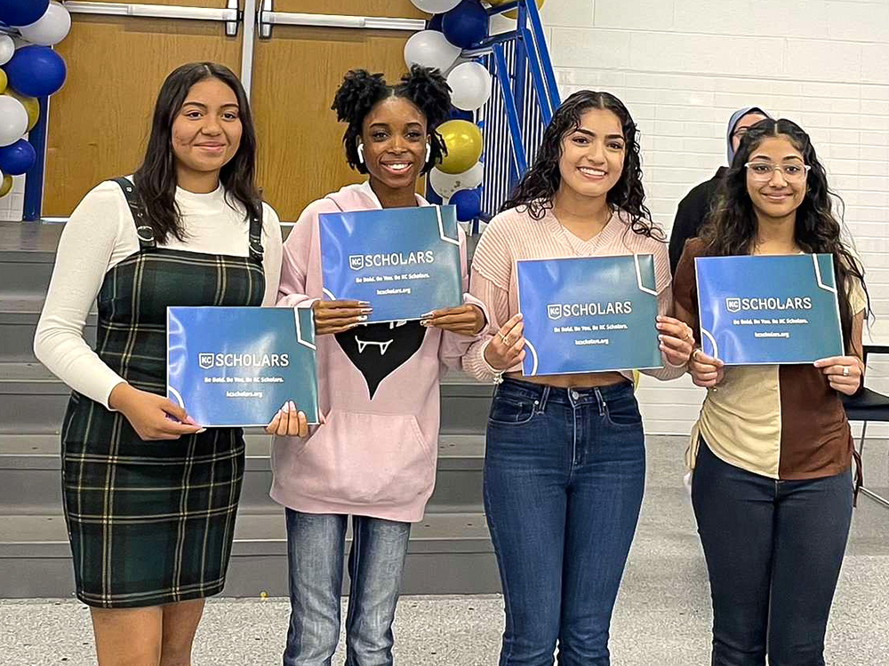 Yuridia Abrego, left, with her fellow KC Scholars from Ruskin High School.