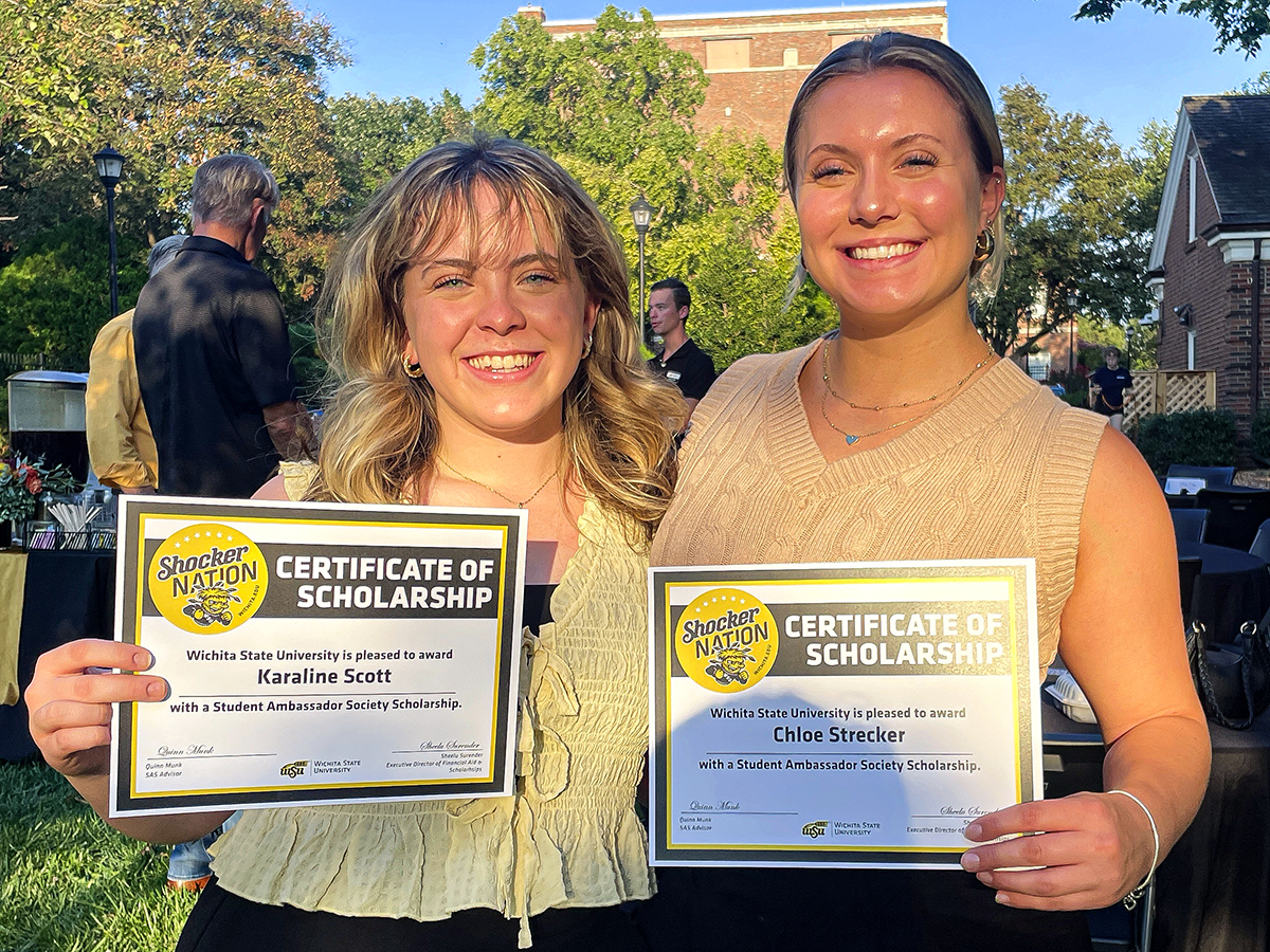 Karaline Scott and Chloe Strecker during SAS's annual dinner at the Wichita State president's house.